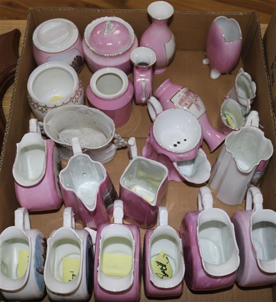 A collection of German pink lustre and white-glazed souvenir china, including jugs, preserve pots, vases and shaving mug (22, faults)